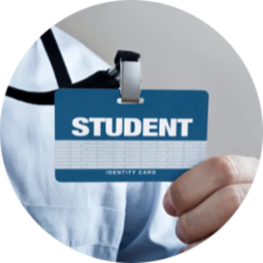 Stock image of someone holding up a student ID badge.